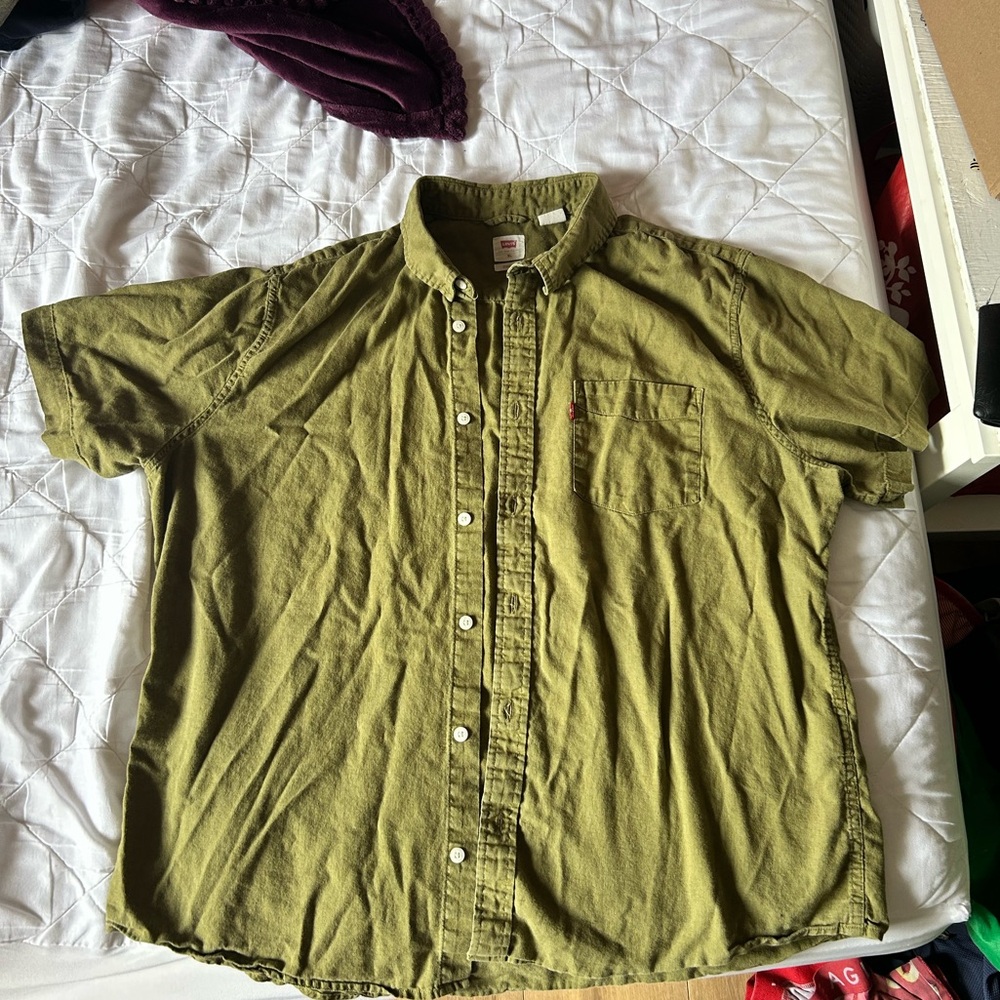 Green, army green button down Levi’s shirt